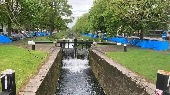 Grand Canal encampment cleared as asylum seekers moved to new locations